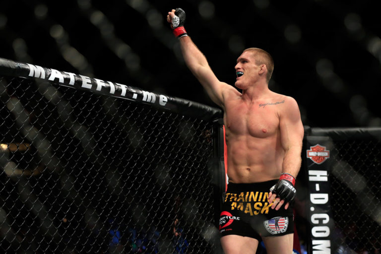 Todd Duffee reacts after defeating Anthony Hamilton in their fight during the UFC 181