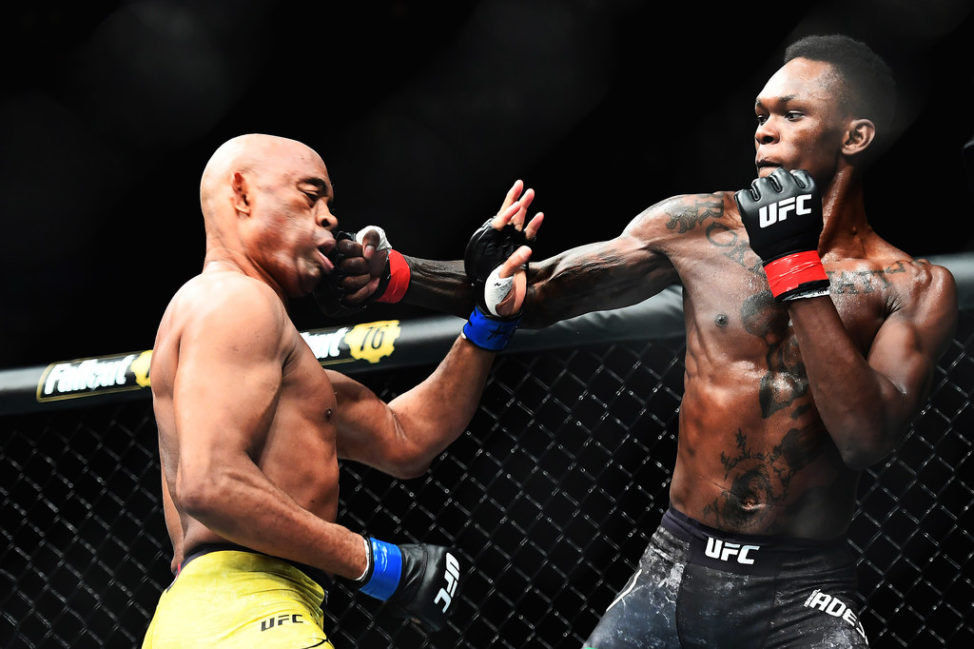 Israel Adesanya of Nigeria punches Anderson Silva of Brazil during their Middleweight bout during UFC234