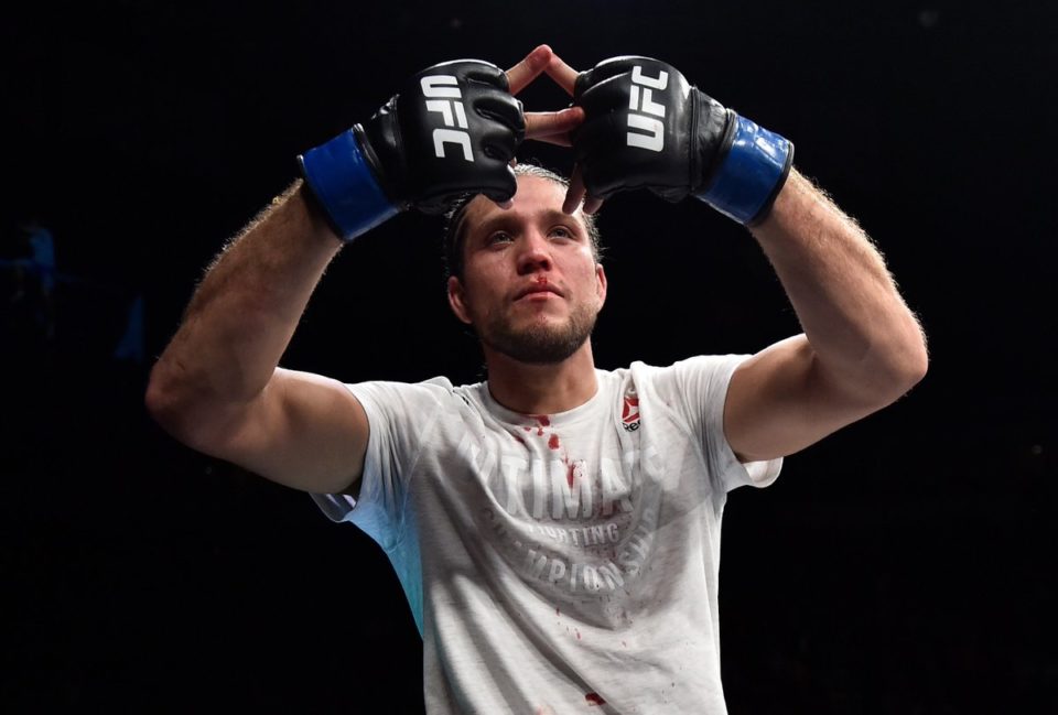 Brian Ortega celebrates after his UFC victory