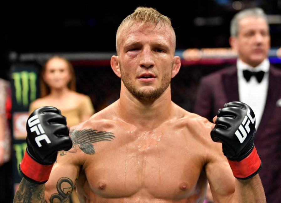 TJ Dillashaw poses following his UFC fight