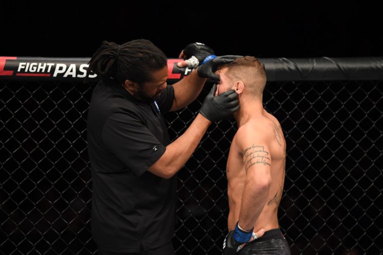 Herb Dean checks Jeremy Stephens' eye at UFC Mexico City