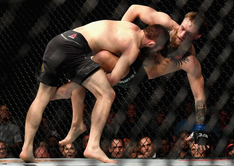 Khabib Nurmagomedov of Russia takes down Conor McGregor of Ireland in their UFC lightweight championship bout during the UFC 229 event