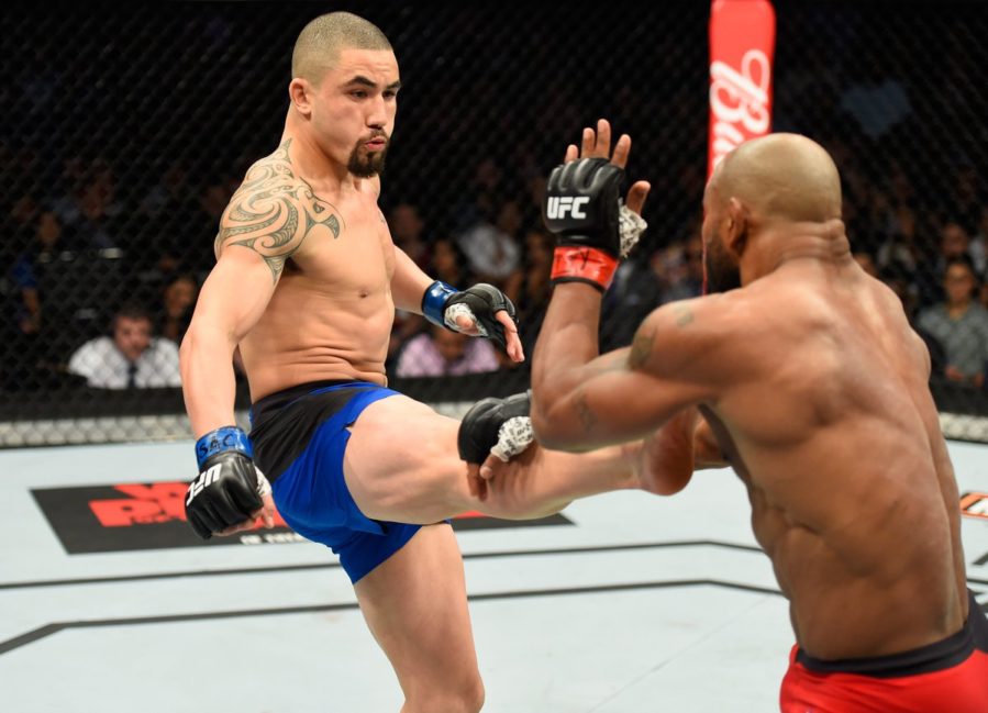 Robert Whittaker kicks Yoel Romero
