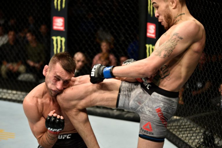 Sean Woodson with a flying knee knockout