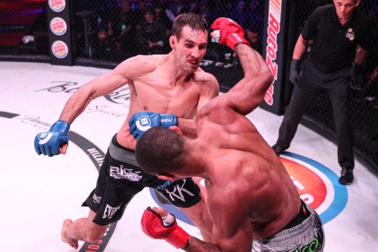 Rory MacDonald exchanges with Douglas Lima in Bellator