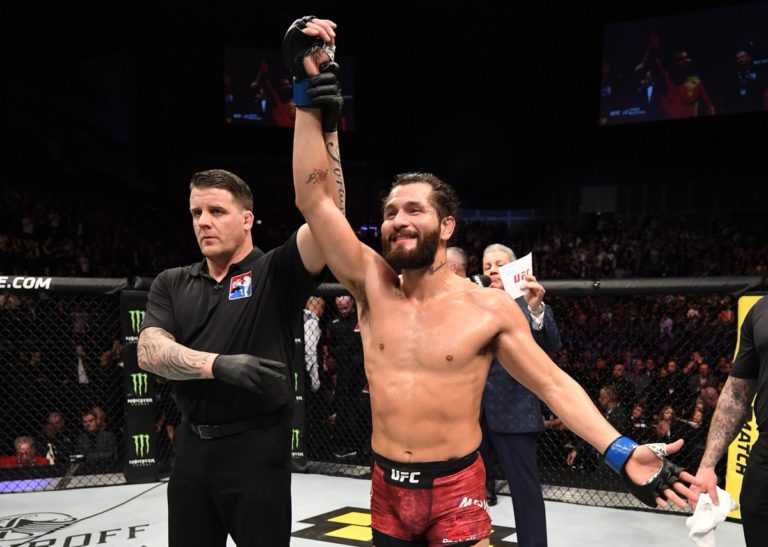 Jorge Masvidal has his hand raised following a UFC win