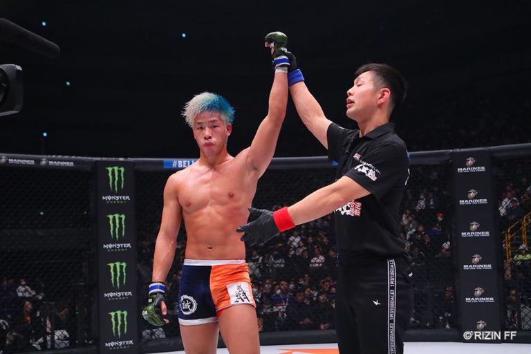Makoto Takahashi gets his hand raised following a win over Yusaku Nakamura.