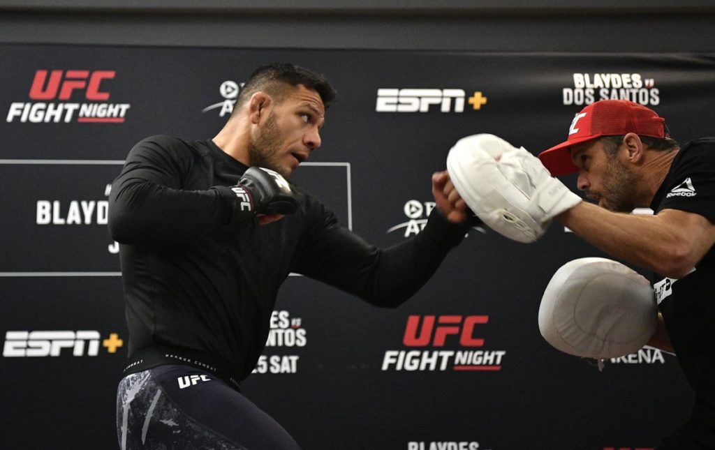rafael dos Anjos hits the pads before UFC raleigh