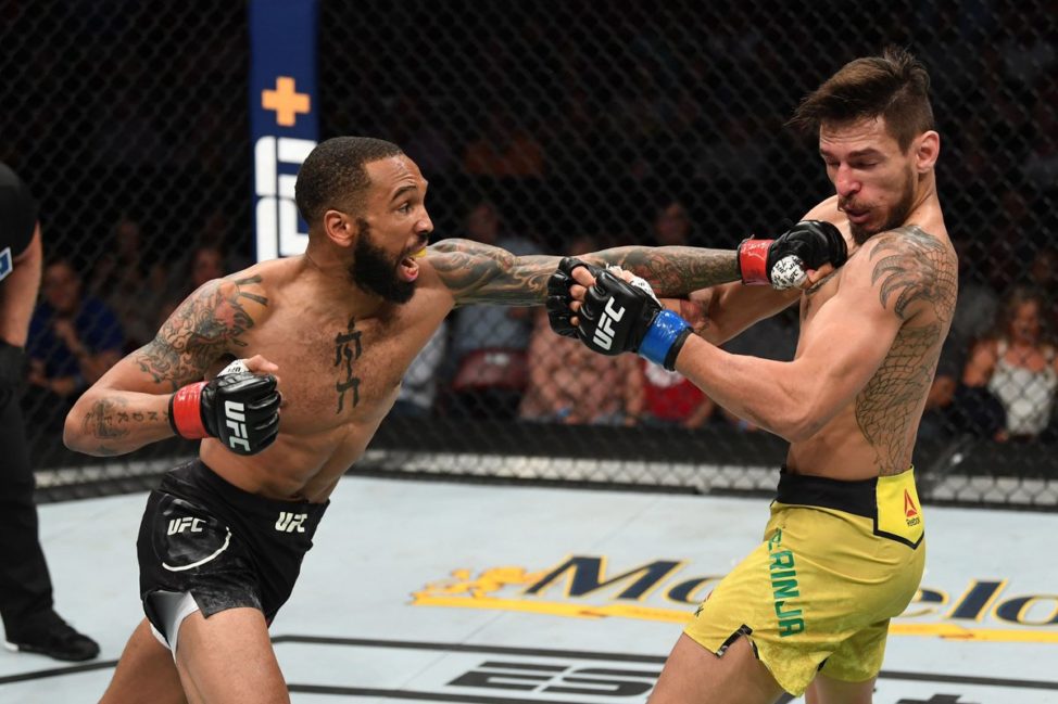 Andre Ewell lands a strike in the UFC