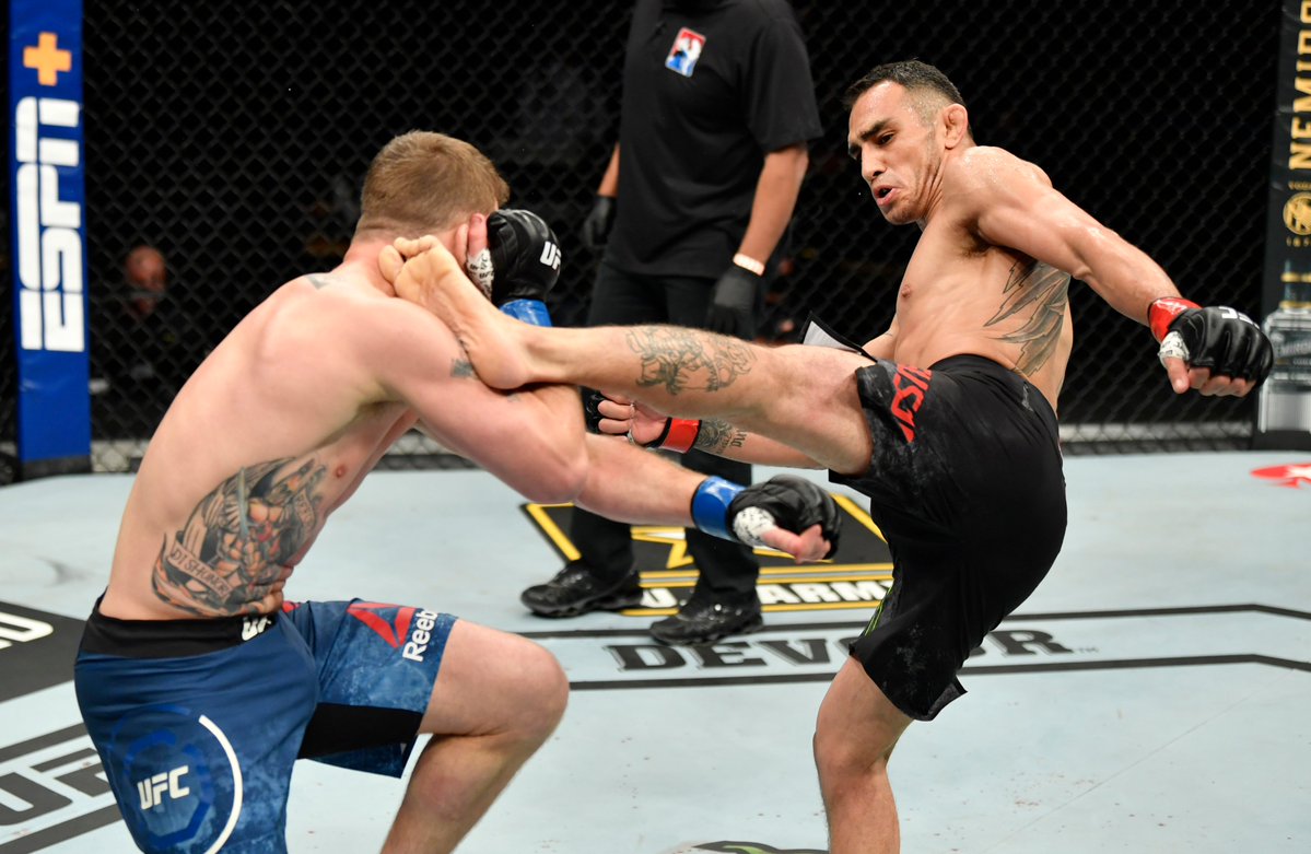 Tony Ferguson kicks Justin Gaethje at UFC 249