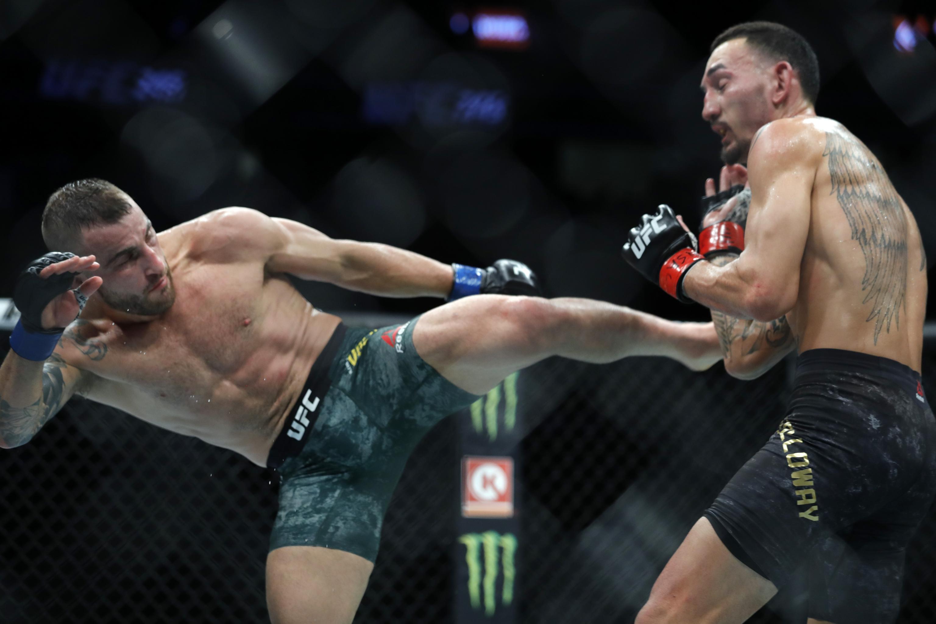 Alexander Volkanovski vs. Max Holloway live blog, play-by-play updates, results, highlights from the vacant UFC Featherweight Championship fight at UFC 251: Fight Island.
