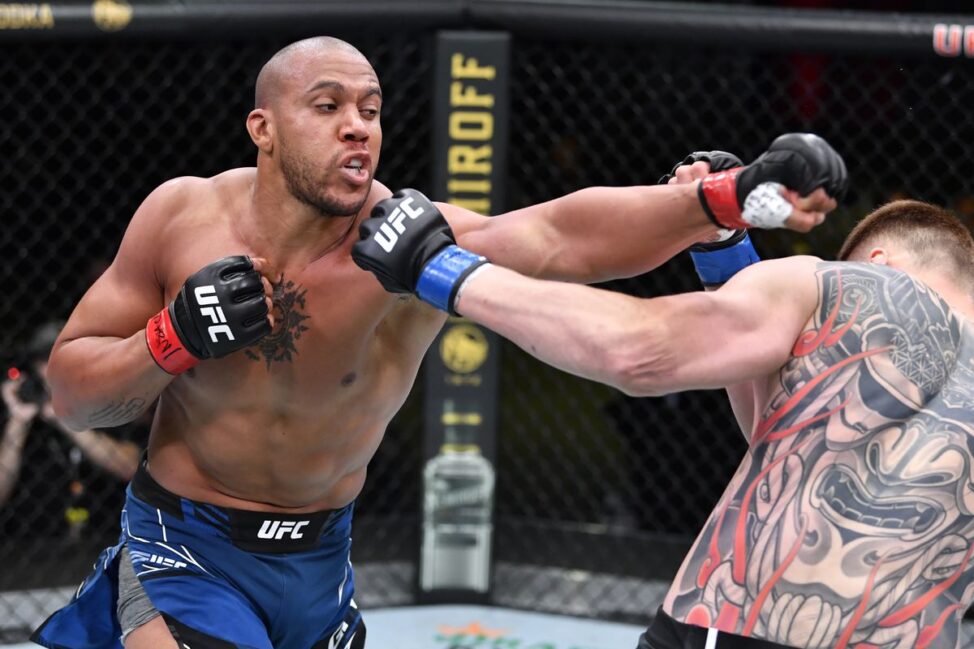 Ciryl Gane strikes Alexander Volkov at UFC Vegas 30 (Zuffa LLC)