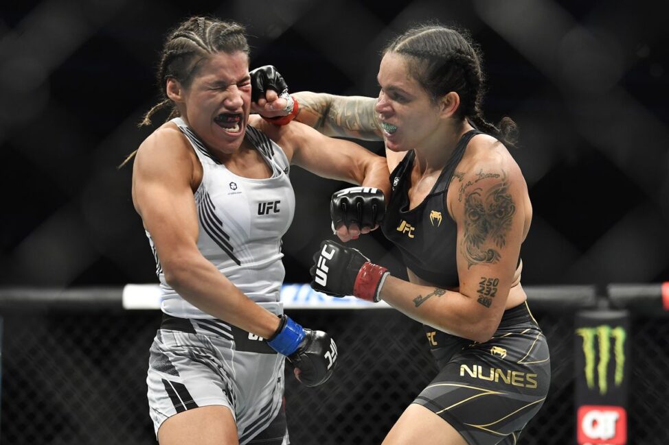 Julianna Pena and Amanda Nunes battle in their thrilling UFC Women's Bantamweight Championship bout (Zuffa LLC)