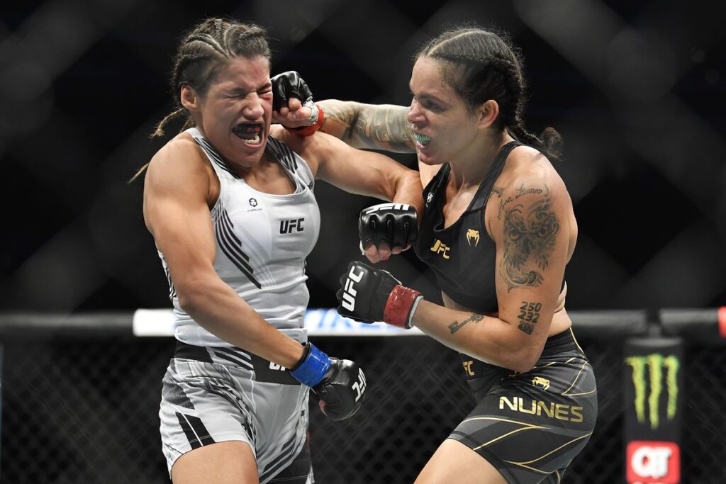 Julianna Pena and Amanda Nunes battle in their thrilling UFC Women's Bantamweight Championship bout (Zuffa LLC)