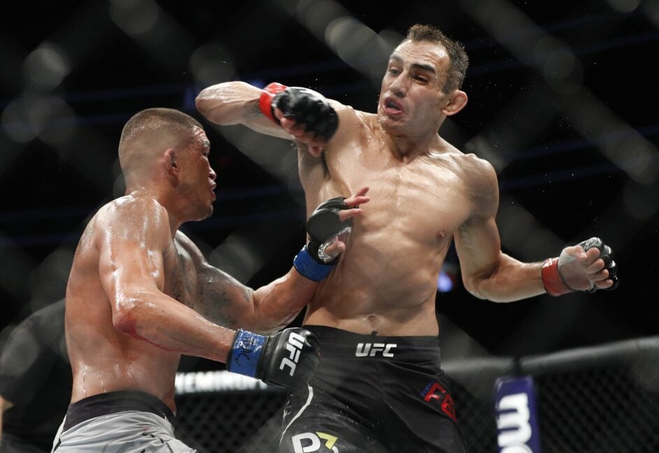 Tony Ferguson throws a spinning elbow at Anthony Pettis (Zuffa LLC)