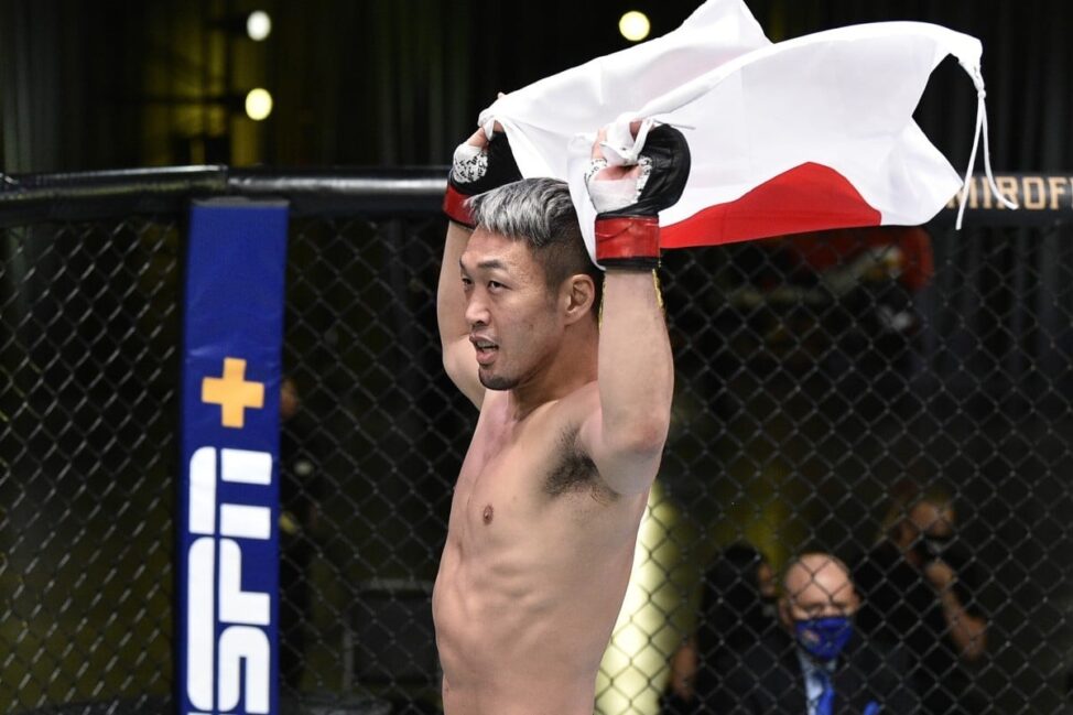Takashi Sato celebrates after 48-second TKO win against Jason Witt (Zuffa LLC)