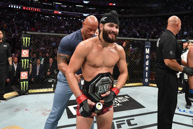 Dwayne "The Rock" Johnson straps the UFC BMF Title around Jorge Masvidal's waist at UFC 244 (Zuffa LLC)