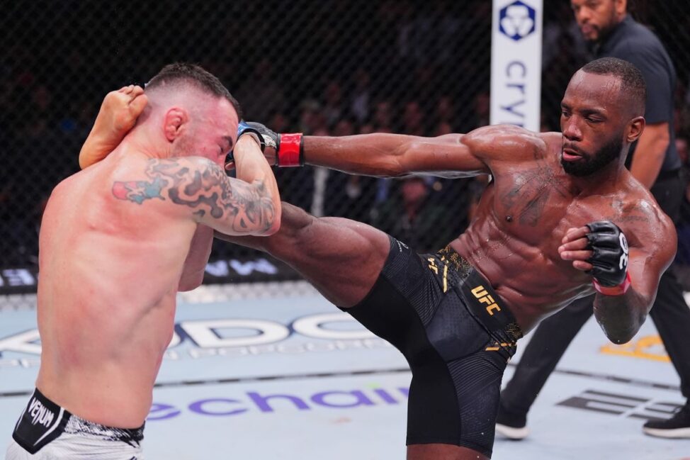 Leon Edwards lands a high kick against Colby Covington at UFC 296